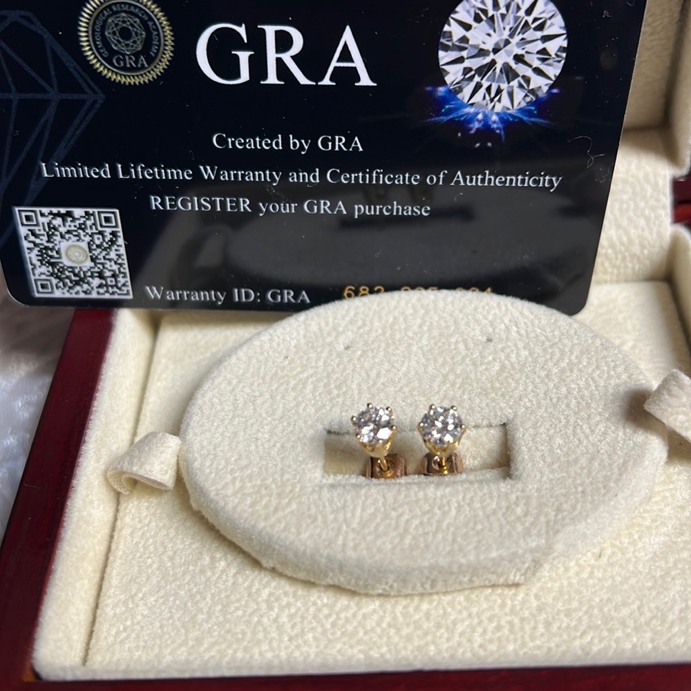 Moissanite earrings sets in 10K yellow gold .5K each ear=1 carat total